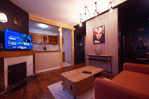 Közös társalgó / TV, Equinoxe, Appartement plein centre-ville, résidence calme (Equinoxe, Appartement plein centre-ville, residence calme) in Auxerre