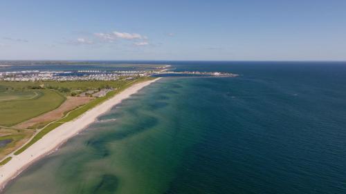 пляж, Ocean King- Penthouse, Ostseeblick, Balkon, Kamin in Oлпеніц