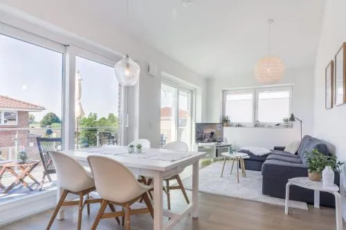 Penthouse-Wohnung "Hygge" mit großer Sonnenterrasse, eigener Sauna & kostenlosem Strandkorb in Wangerland, Deutschland
