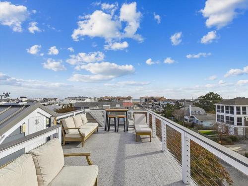 Beach House with Rooftop Deck by Leavetown Vacations