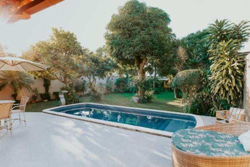 مسبح, Casa Aconchegante com Área Gourmet e Piscina (Casa Aconchegante com Area Gourmet e Piscina) in Barra Do Jucu