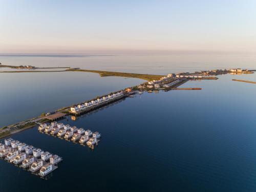 Фасада на хотела, SeaPearl- Hafenblick, Terrasse, Bad mit Infrarotsauna und Whirlwanne in Olpenitz