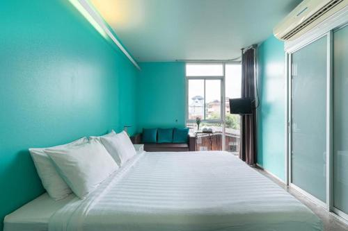 ห้องเตียงใหญ่พร้อมห้องน้ำส่วนตัว (Double Room with Private Bathroom)