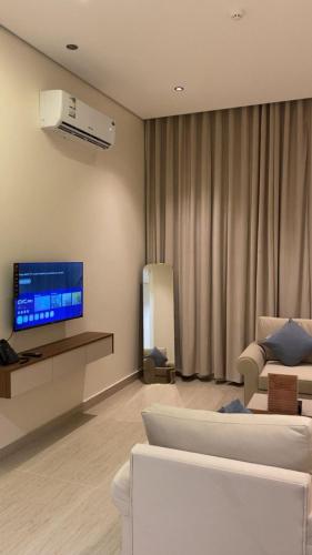 Shared lounge/TV area, شقق نيفا المخدومة in Ha'il