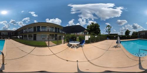 Úszómedence, Motel 6 Conroe, TX in Conroe (Texas)
