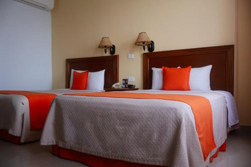 Hotel Báez Carrizal - Tap to explore photos
