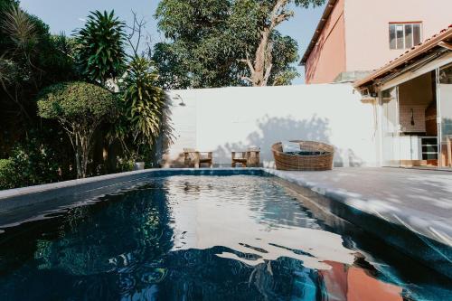 مسبح, Casa Aconchegante com Área Gourmet e Piscina (Casa Aconchegante com Area Gourmet e Piscina) in Barra Do Jucu