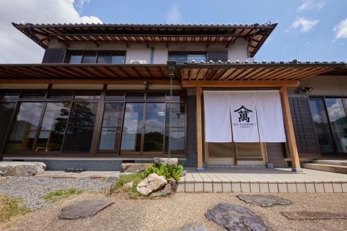 IZA cominca 萬 in 龜岡