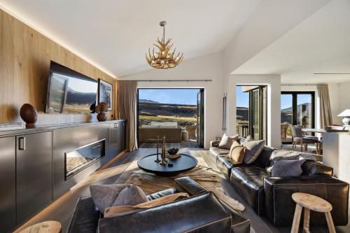 Shared lounge/TV area, Mt Cardrona Station Resort in Cardrona