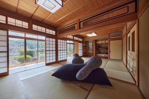 IZA cominca 萬 in 龜岡