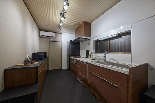 IZA cominca 萬 in 龜岡