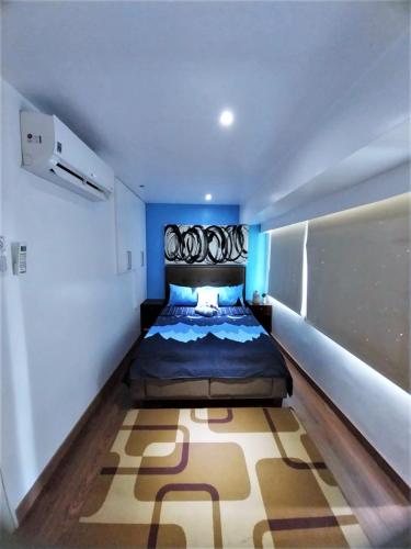2 BR loft-type condo Fort Victoria, Manila