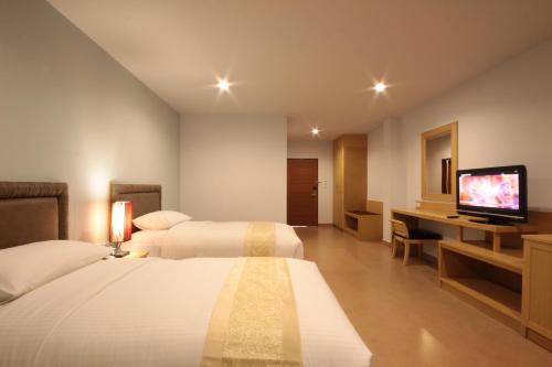 Foto - Paragon Suites Resort