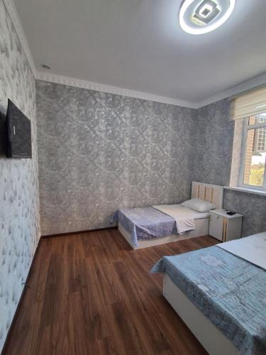 Bed, Xojai Jahon HOTEL in Gijduvon in Malikrabot