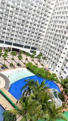 Pool view from one-bedroom condo at Shore Residence, Manila
