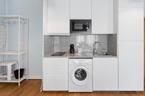 kuhinja, GuestReady – Urban comfort in Vila Nova de Gaia in Mafamude