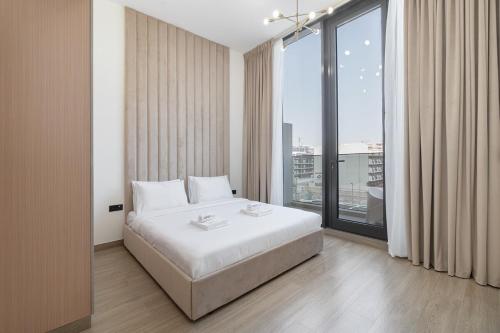 Modern Aura Living Chic 1BR Hideaway in JVC, Dubai (photo 2)