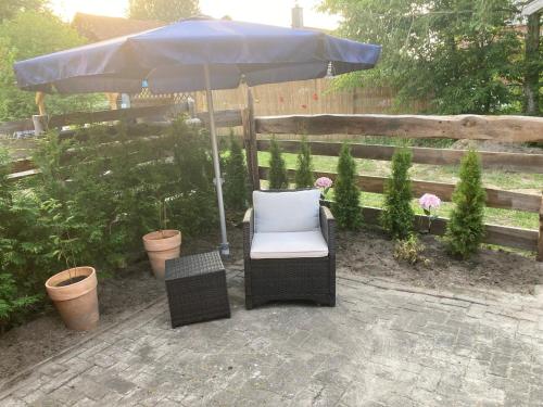 花園, OLD TINY HOUSE Laave Ferienwohnung in 菲蘭克