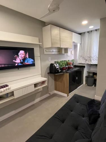 Shared lounge/TV area, Rocinha Apart in Rocinha