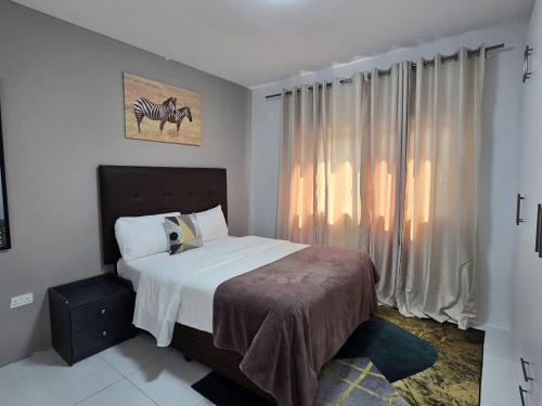 Zachi Zebra Apartment in คิตเว่