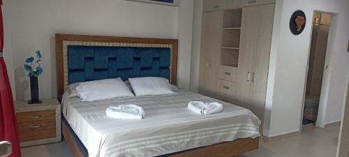 Habitacion en casa campestre con piscina in La Palmera