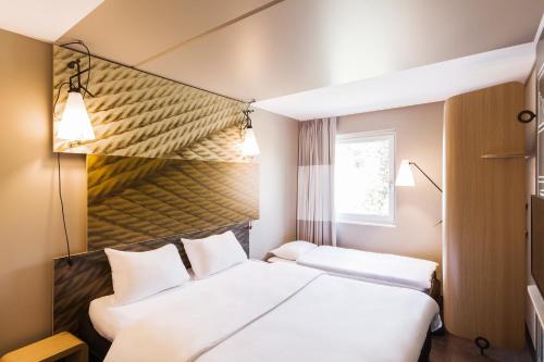 イビス ヴィンタートゥール シティRoom with double bed (63X79 in.) + single bed ( 31x75 in.), new sleep-easy concept