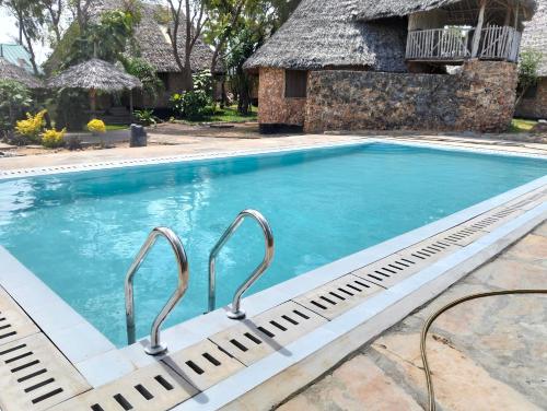 Swimming pool, Kikambala Eco Villas in Mombasa