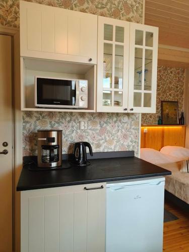 托尼曼塔羅酒店 (Tohninmaen Talo) in 托伊薩