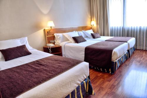 Chambre triple, 3 lits