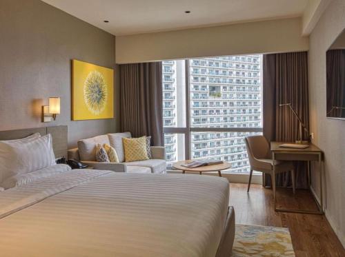 AMOREsuite Hotel Residences at Acqua, Manille (photo 3)