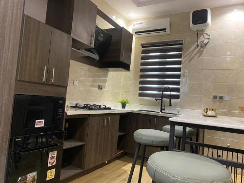Kitchen, Zuwa Apartments Rental Home in Alimosho