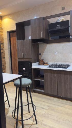 Kitchen, Zuwa Apartments Rental Home in Alimosho