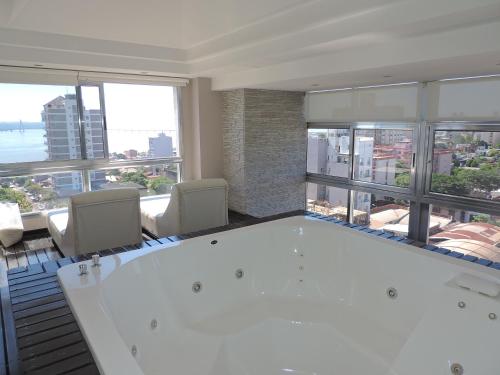 Shared lounge/TV area, Apart Belgrano in Posadas