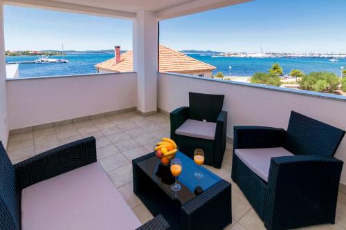 Two-Bedroom Apartment with Balcony and Sea View