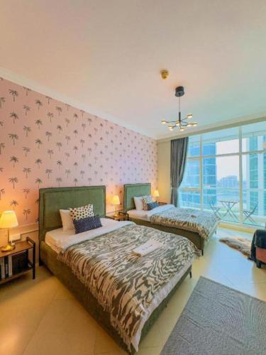 Walk to JBR Marina Beach & Tram! Luxury Family 3BD, Stunning Views, Dubaj (fotografie 9)