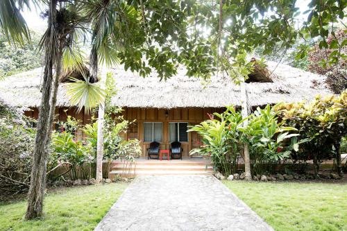 Entrance, Jungle Lodge Tikal Hostal in Tikal