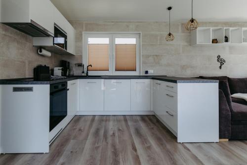 Blue Flamingo Ferienhaus am Badesee mit Garten in Rauchwart