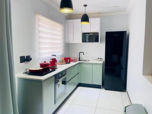 virtuve, ANG COMSAT Guesthouse in Northam