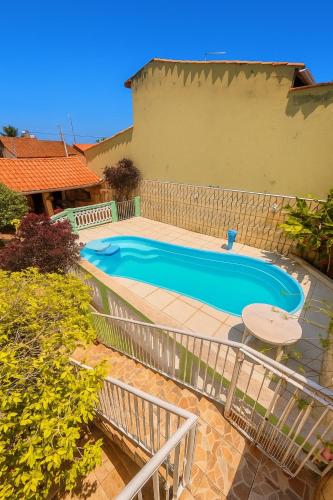 Casa com piscina na praia das palmeiras