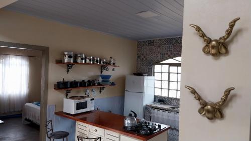Kitchen, Chale Rosa in Jardim Esmeralda