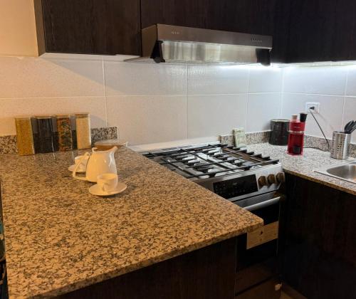 Kitchen, Mi casa es tu casa in Villa Mella