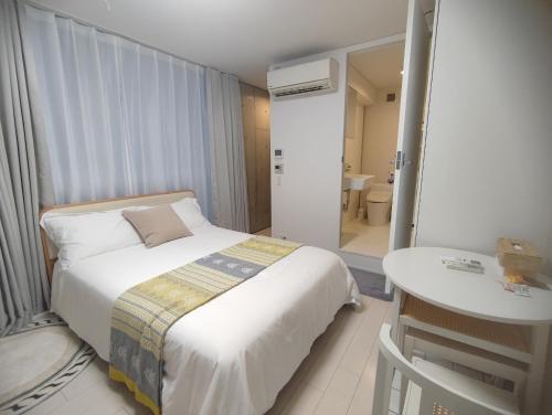 302Room,7-minute walk from Uguisudani Station located on the 3nd floor of an apartment-style building Twin room No elevator, Tokio (fotografie 11)