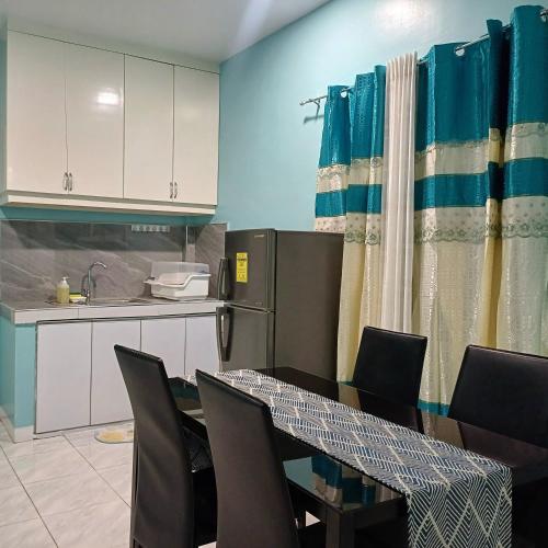 Jens Samal Vacation Rental - Centrally Located - Fully Furnished 2br WIFI near Repelling Platform