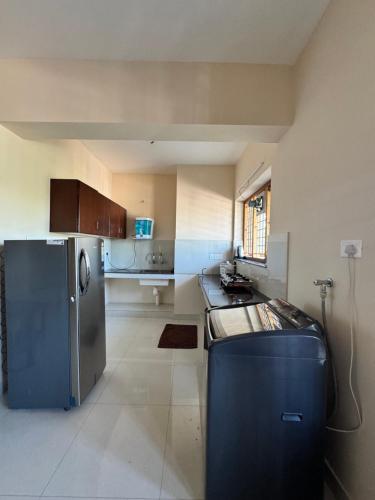 Kitchen, Nachiyar Suites in Thiruvananthapuram