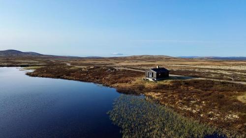 Hyggelig fiskebu ved Langrumpa fiskevann in Enden