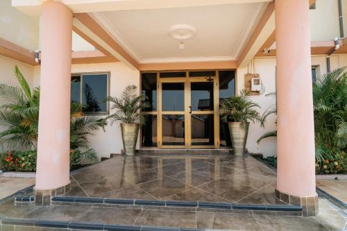 ทางเข้า, Woodpoint Apartments in ดอว์เฮนยา