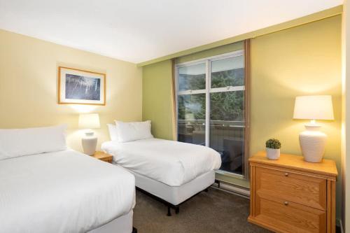 Woodrun Lodge 306 | Budget-friendly Ski-in-Ski-out Condo w/ Heated Pool, Hot Tub, Fireplace in Whistler, Canada