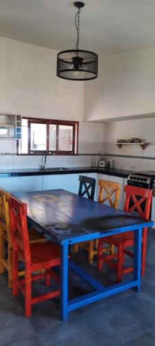 Casa vacacional con pileta y quincho - El Mollar