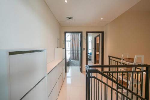 Yogi – 4BR Villa | DAMAC Hills 2 | Garden in Damac Hills 2