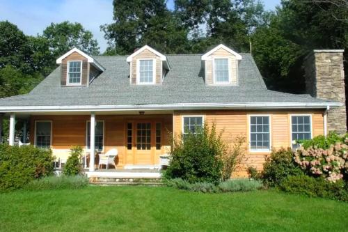 Secluded Cottage Rental with a Heated Pool in Red Hook for Family Getaways in New York State in Pine Plains